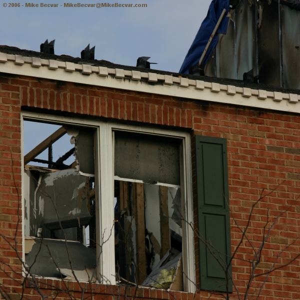 looking into window of townhouse